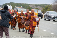 The monks are on their way to their lunch break on the other side of the bridge over Jordan Lake...