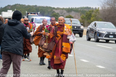 The monks are on their way to their lunch break on the other side of the bridge over Jordan Lake...